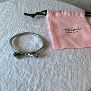 Kate Spade: Silver Tone Bracelet with Bow- Side Clasp